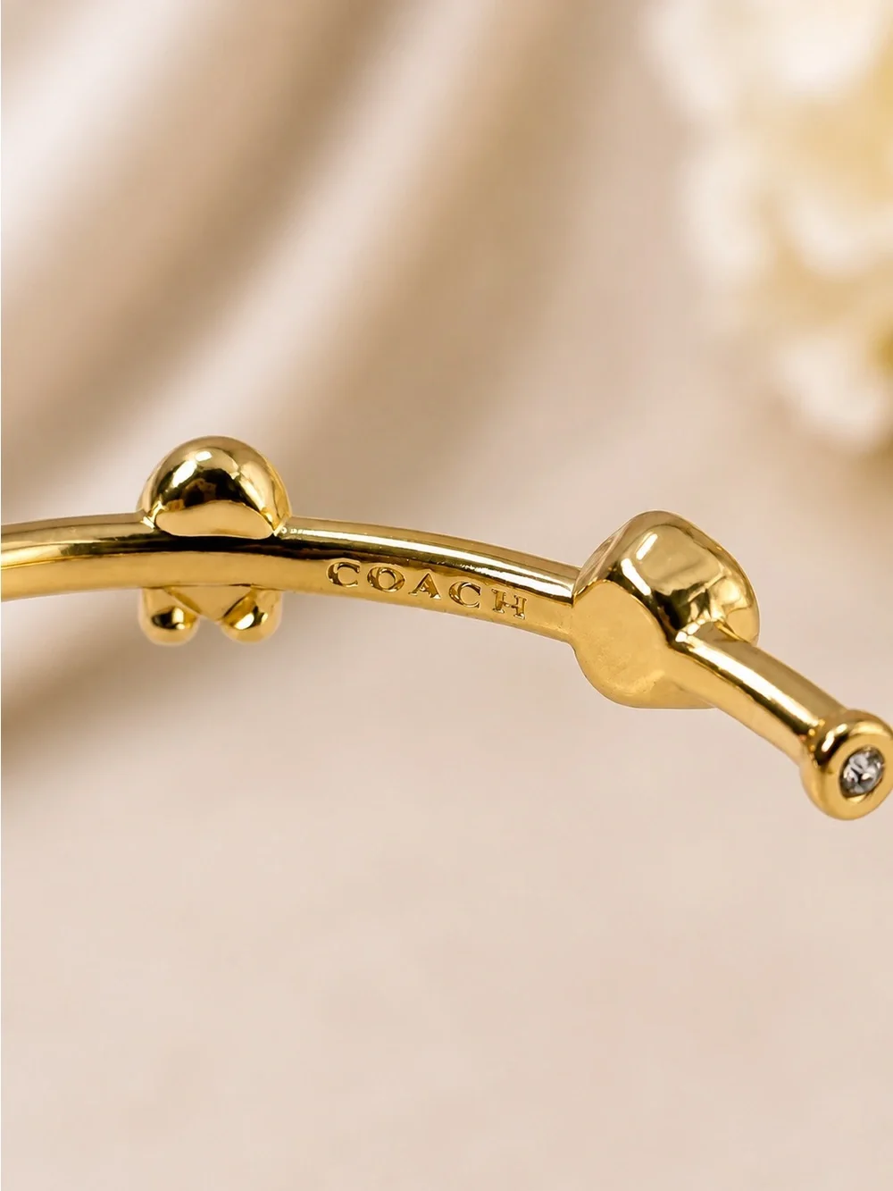 Coach Gold Tone Crystal Accent Hoop Earrings